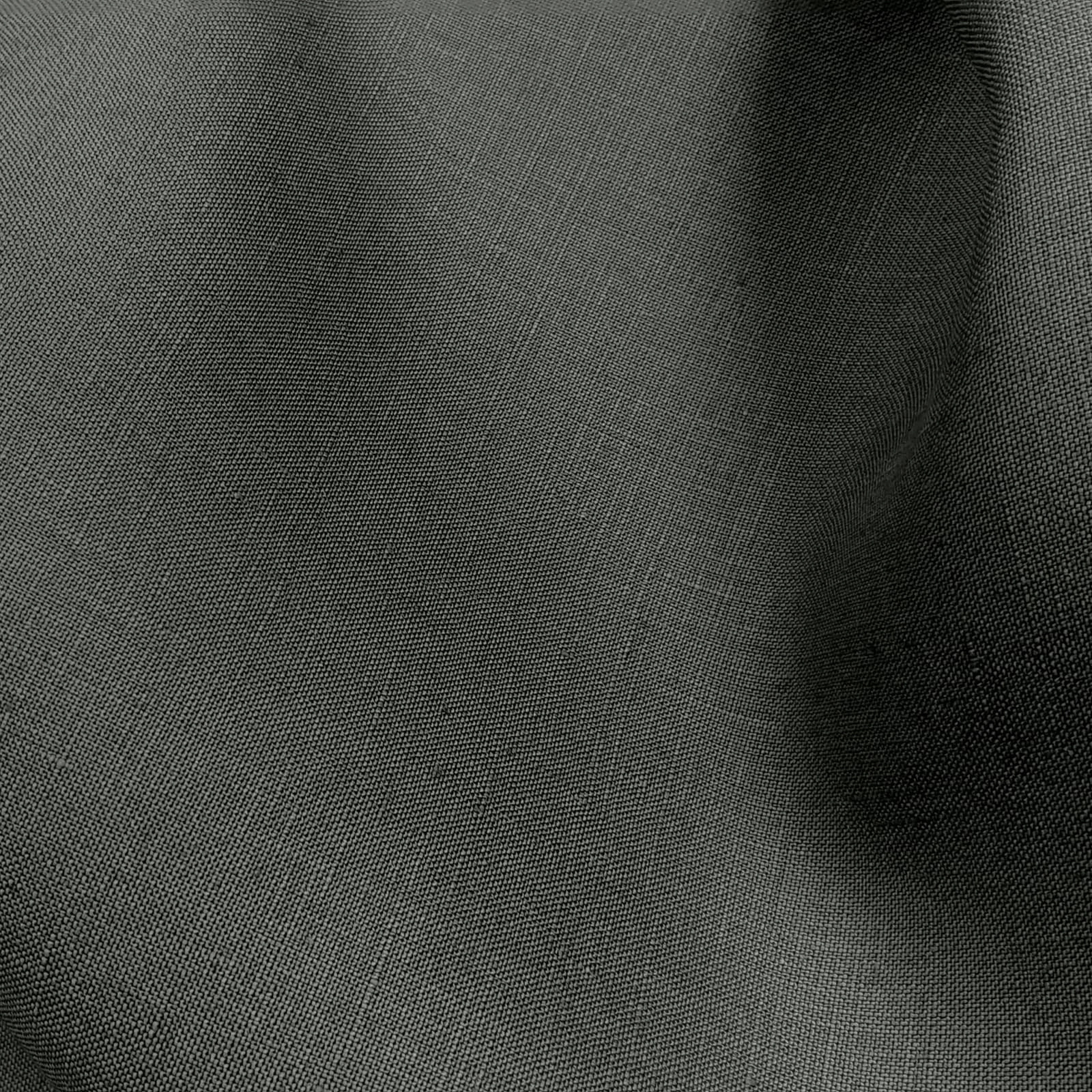 Graphite grey Baird McNutt mercerized linen suiting fabric, fully shrunk, close-up showing fine weave texture and soft drape, premium breathable linen for luxury suits, tailored jackets, and refined summer menswear.