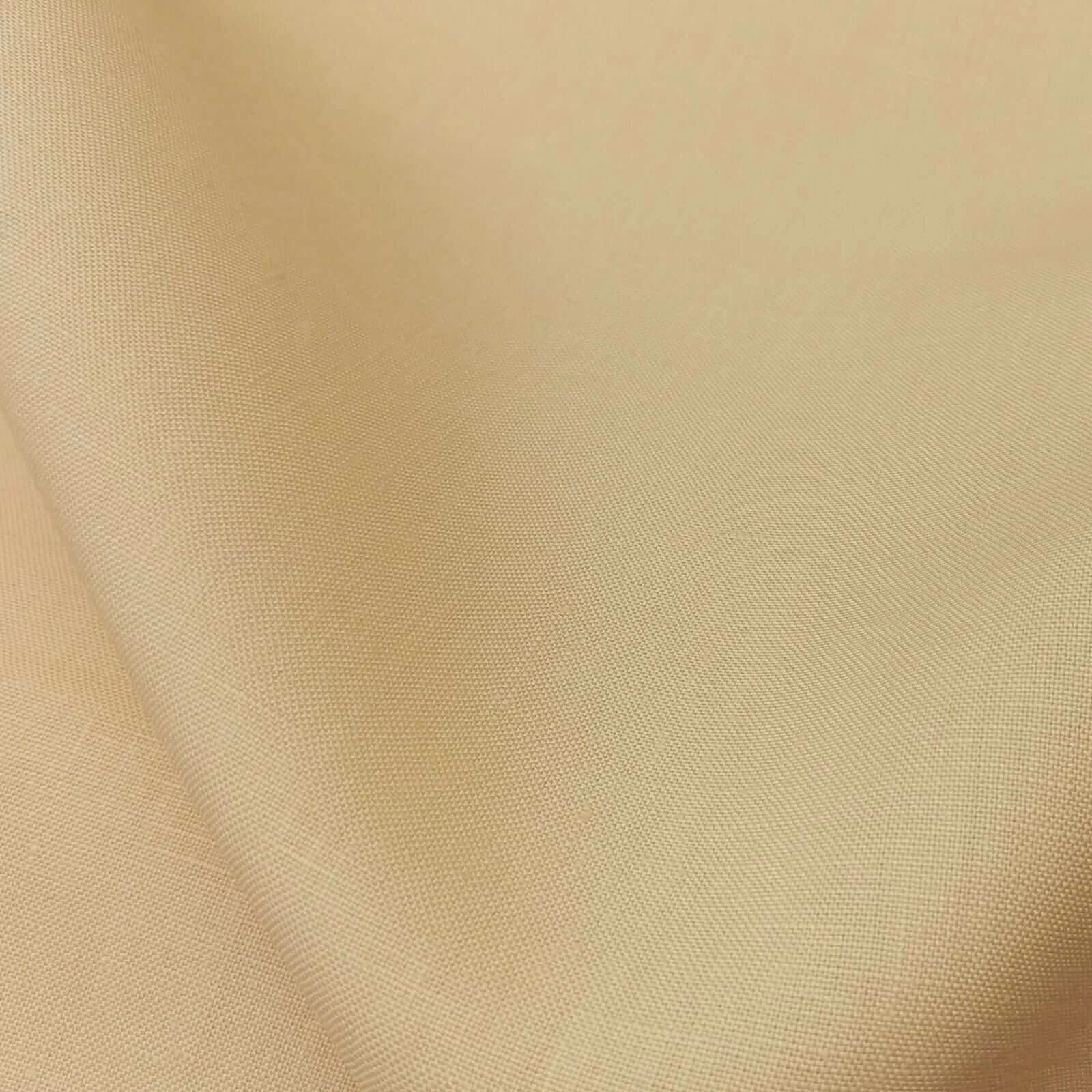 Sahara desert sand Baird McNutt mercerized linen suiting fabric, fully shrunk, close-up showing fine weave texture and soft natural drape, premium breathable linen for luxury summer suits, tailored jackets, and warm-weather menswear.