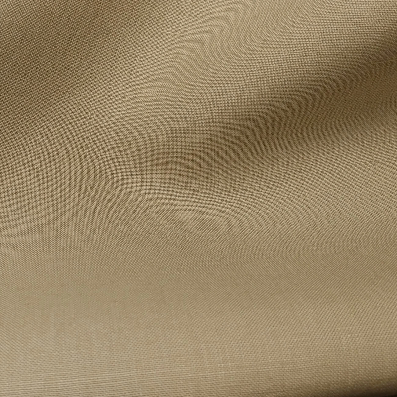 Taupe Baird McNutt mercerized linen suiting fabric, fully shrunk, close-up showing fine weave texture and soft natural drape, premium breathable linen for tailored suits, summer jackets, and refined warm-weather menswear.