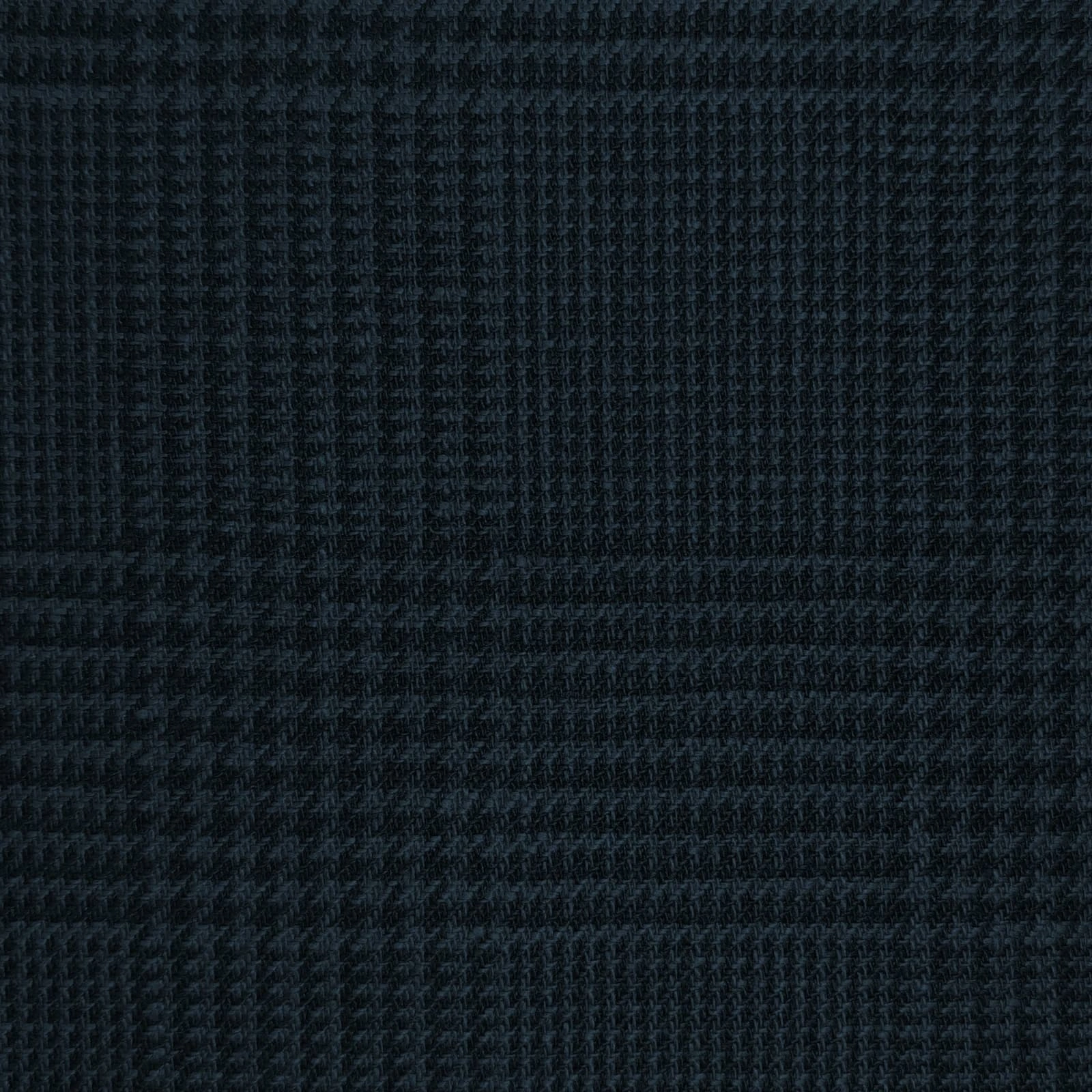 Dark check linen suiting fabric, close-up showing fine structured weave with crisp body and soft hand feel, premium breathable linen ideal for tailored jackets, summer suits, and sophisticated business and evening menswear.