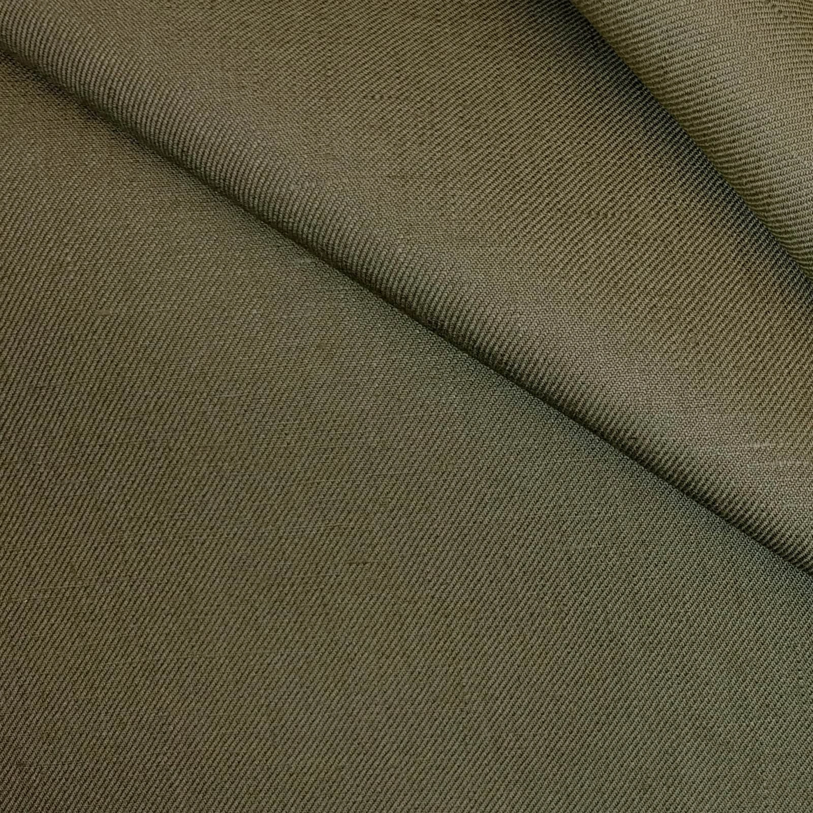 Khaki twill linen suiting fabric close-up showing fine diagonal weave, crisp structure, and soft hand feel, premium breathable linen ideal for summer suits, tailored jackets, smart casual business wear, and refined menswear styling.