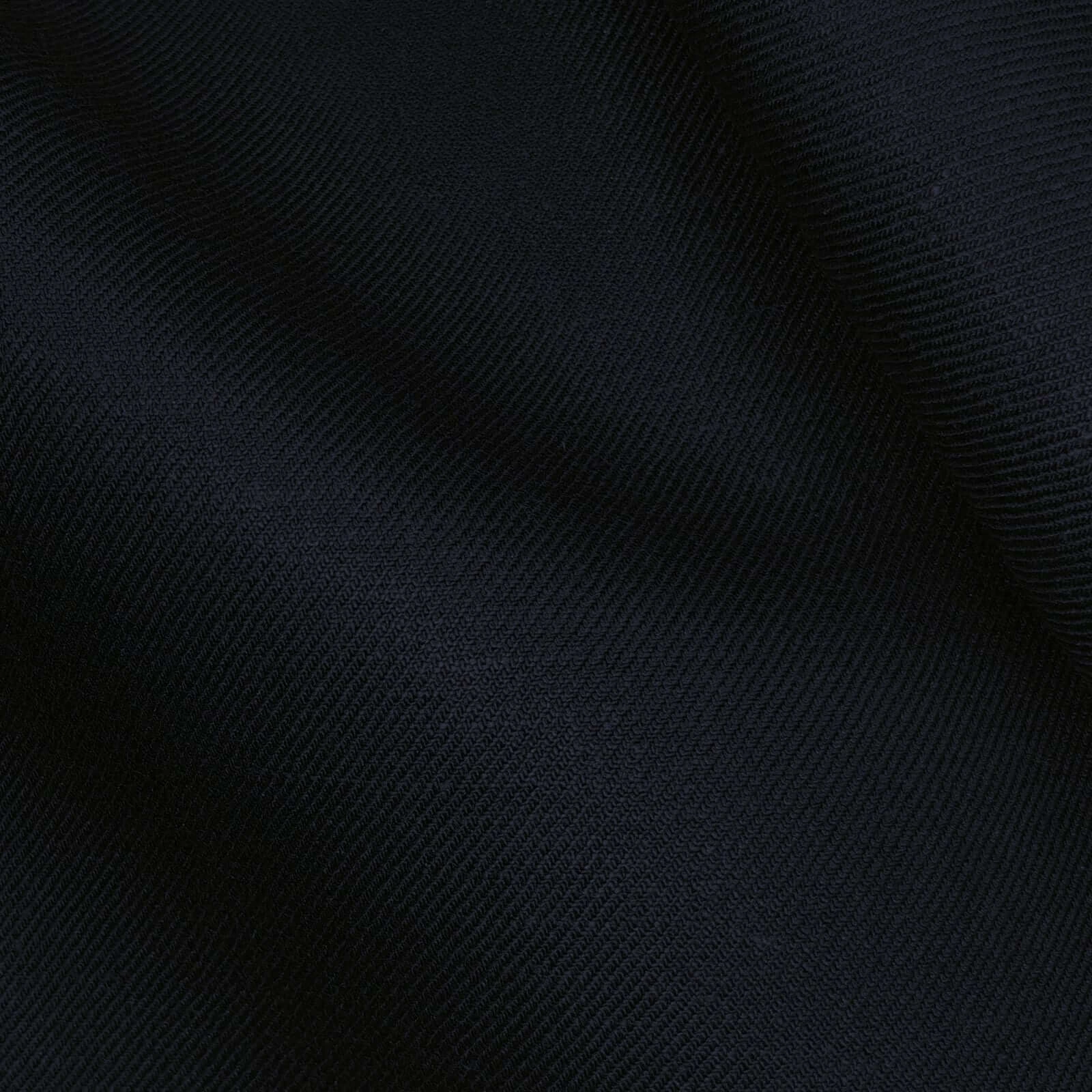 Navy twill linen suiting fabric close-up showing fine diagonal weave, crisp structured body, and soft hand feel, premium breathable linen ideal for summer suits, tailored jackets, business wear, and formal menswear styling.