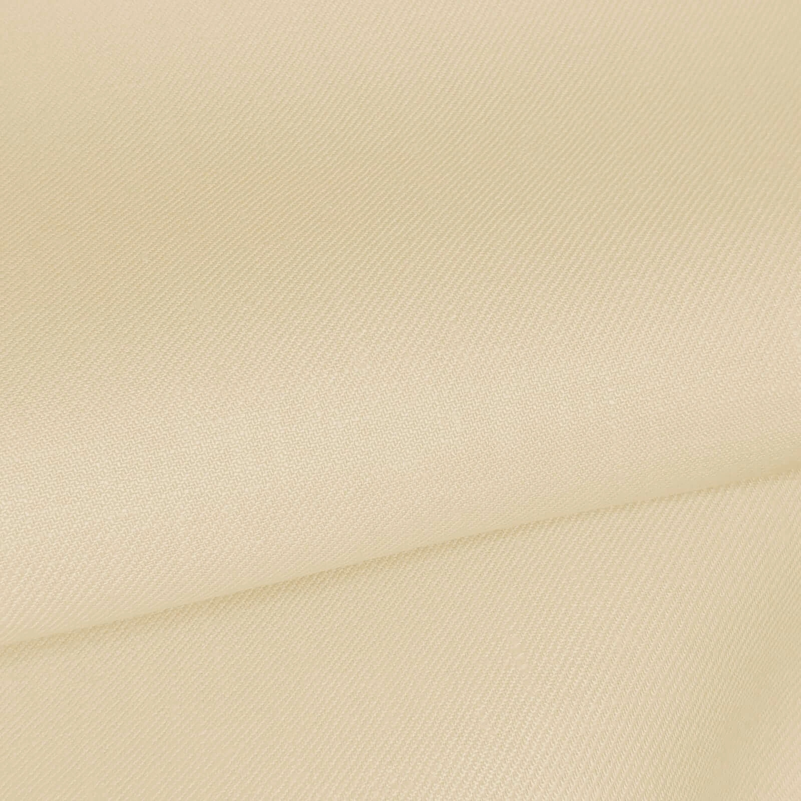 Sahara beige twill linen suiting fabric close-up with fine diagonal weave, crisp structure, and soft hand feel, premium breathable linen ideal for summer suits, wedding attire, tailored jackets, and refined menswear styling.