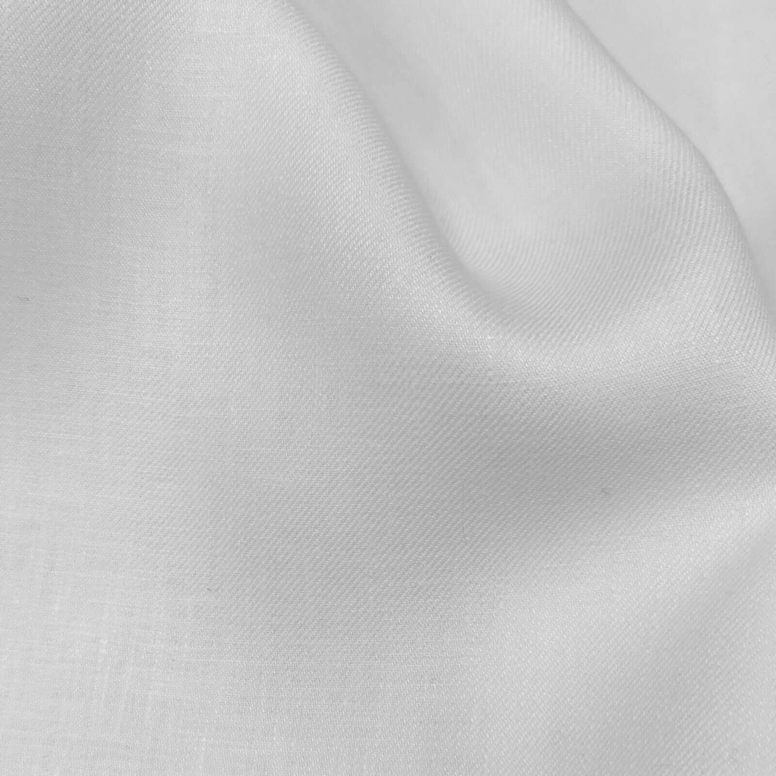 White twill linen suiting fabric close-up with fine diagonal weave, crisp structure and soft hand feel—premium breathable linen for summer suits, wedding tailoring, luxury menswear, and lightweight formal jackets