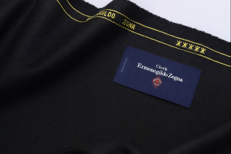 Official Zegna Italian Mill Label: An essential brand collateral provided with genuine bespoke suit fabric to guarantee origin and Super-count authenticity