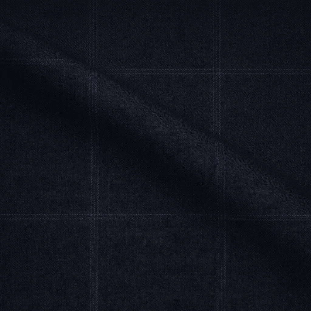 VBC dark blue windowpane check wool suiting fabric close-up, Super 110s Italian wool with subtle tonal checks, ideal for business suits, formal tailoring, and premium bespoke menswear craftsmanship